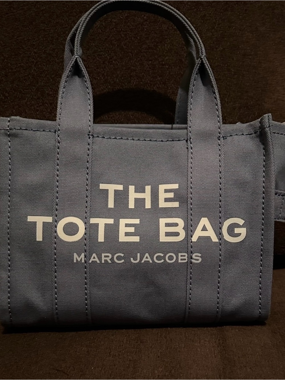 Marc Jacobs Slate Blue Canvas Tote with Bold Logo.